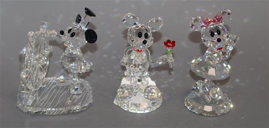 Three Disney Showcase crystal figurines (Steamboat Willie, Just for You, Gee, Youre the Sweetest) and a Chinese glass sphere,